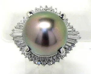 Black Pearl & Diamond Ring in Platinum