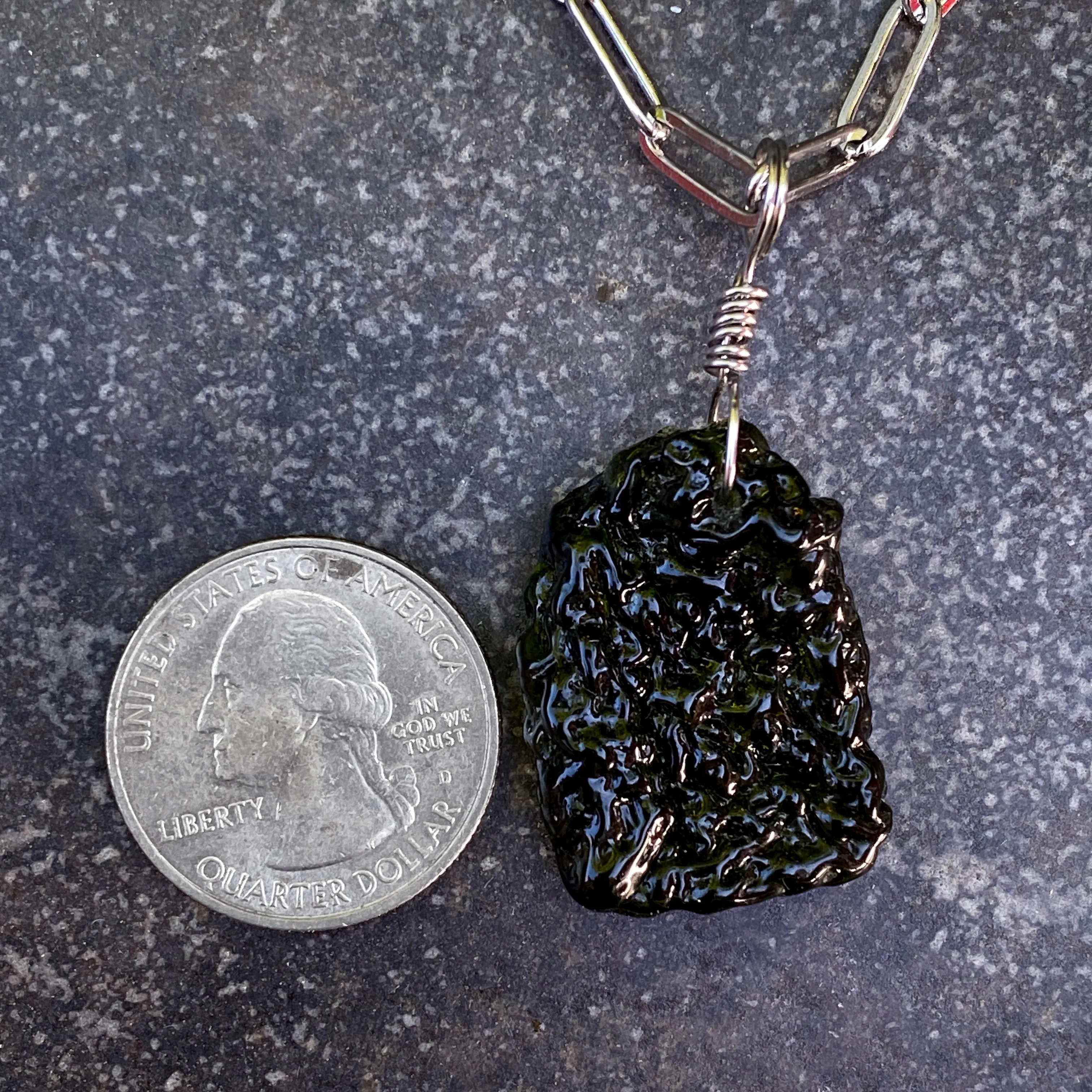 Moldavite Pendant on stainless steel chain necklace.