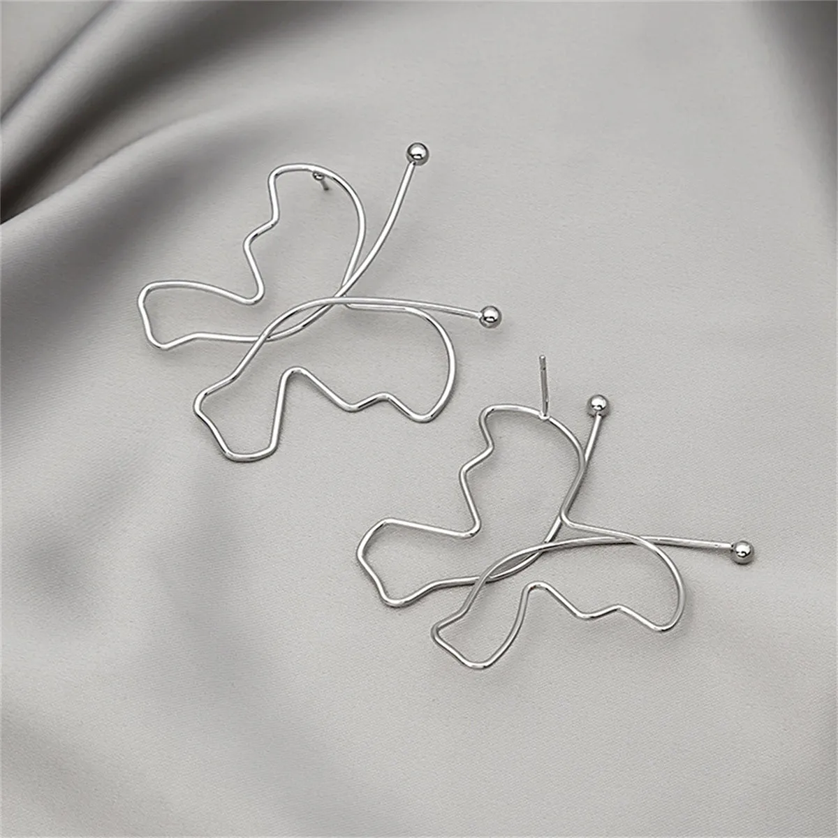 Silver-Plated Openwork Butterfly Stud Earrings