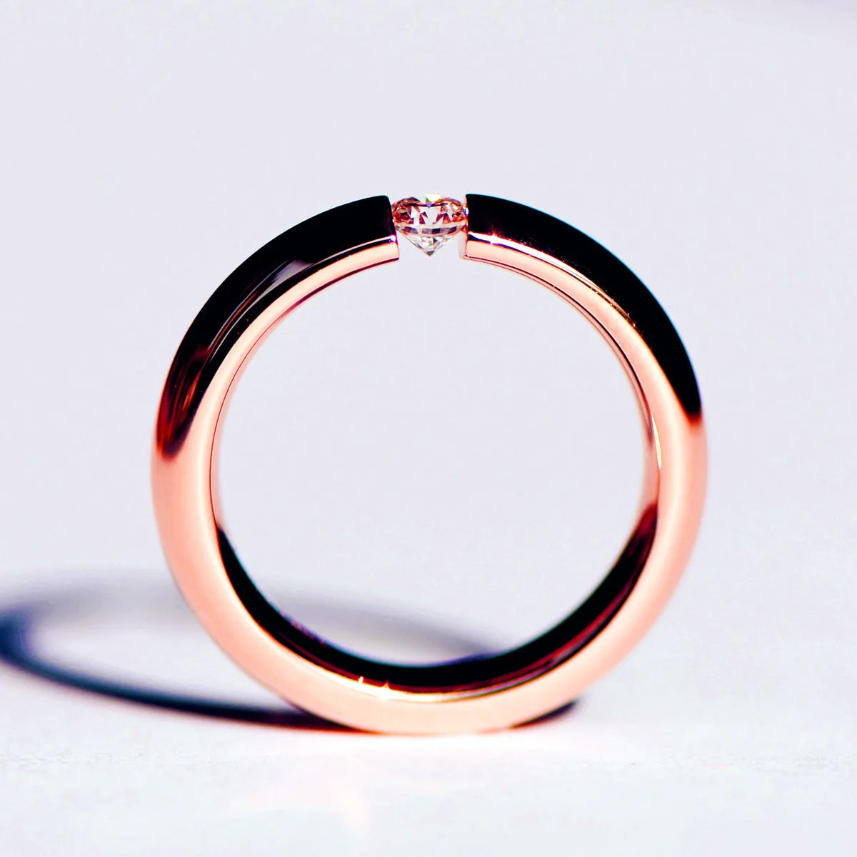 Tension Set Diamond Couples Wedding Ring