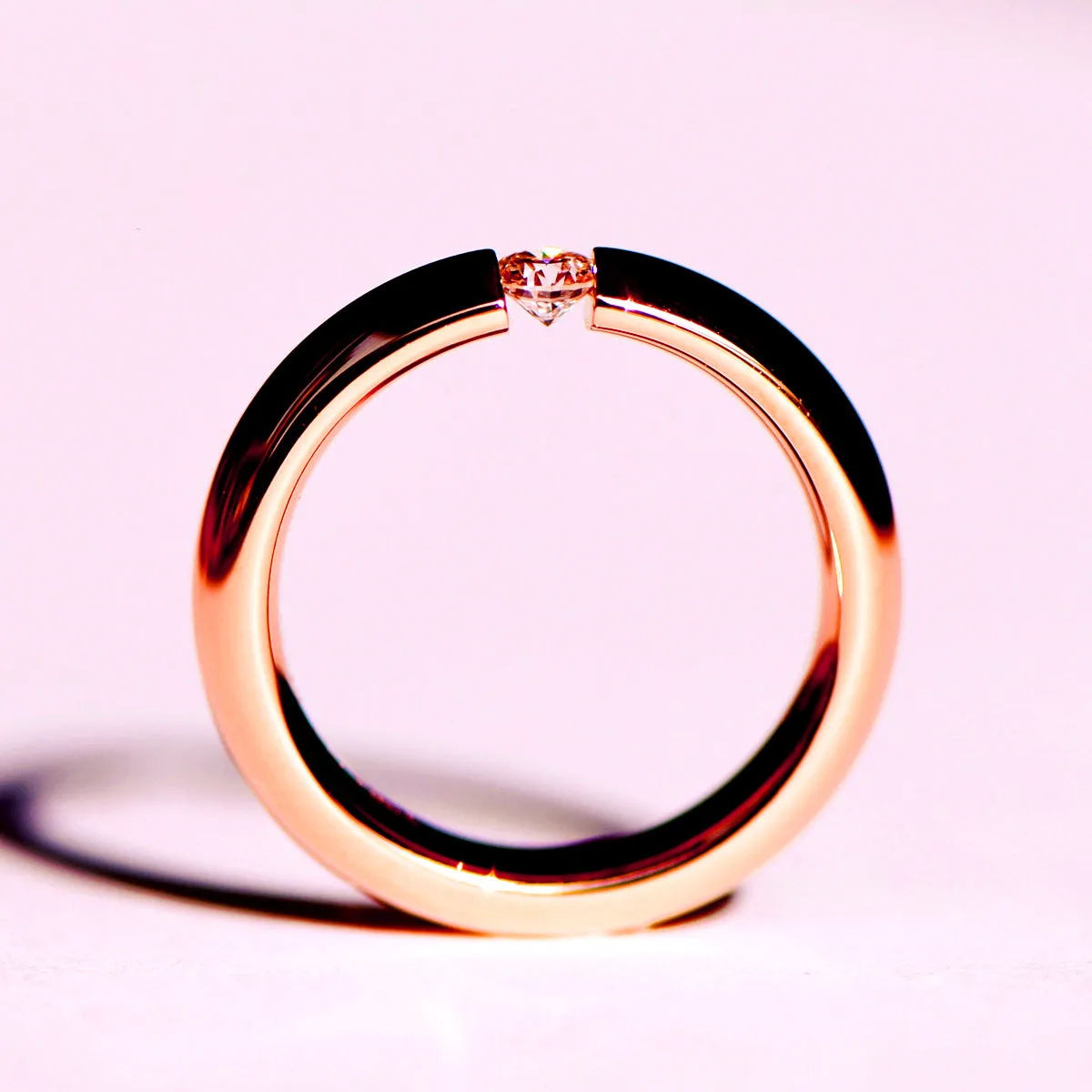 Tension Set Diamond Couples Wedding Ring